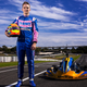 Oscar Piastri during a photoshoot showing off his place as an Alpine reserve driver.